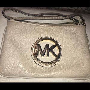 Cream Michael Kors wristlet